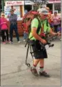  ??  ?? Fair goers take in the sights at the Great New York State Fair in Geddes on Monday, Aug. 28, 2017.