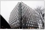  ?? STEFAN ROUSSEAU/GETTY IMAGES ?? The new U.S. Embassy, set on the south bank of the Thames River, is set to open in January.