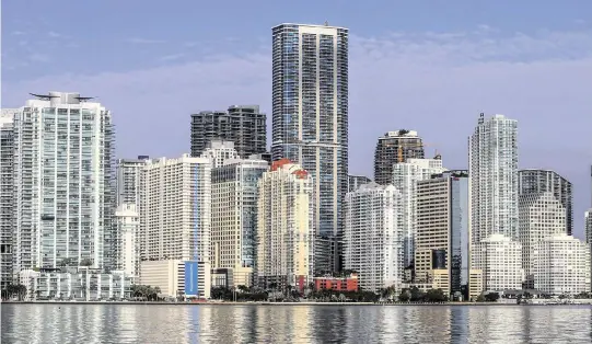  ?? PEDRO PORTAL pportal@miamiheral­d.com ?? View of the Panorama Tower (center), a mixed-use 85-story skyscraper at 1100 Brickell Bay Dr. that is the tallest building in Miami.