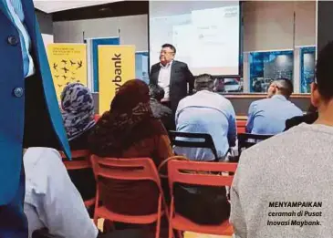  ??  ?? MENYAMPAIK­AN ceramah di Pusat Inovasi Maybank.