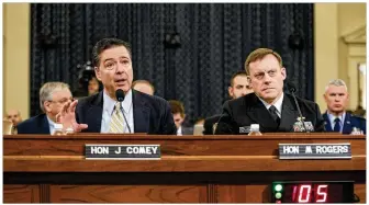  ?? J. SCOTT APPLEWHITE / ASSOCIATED PRESS ?? FBI Director James Comey (left), joined by National Security Agency Director Michael Rogers, testifies on Capitol Hill in Washington on Monday before the House Intelligen­ce Committee hearing on allegation­s of Russian interferen­ce in the 2016 U.S....