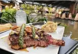  ?? ?? Ribeye Valentino at Landry’s Seafood House is a sophistica­ted surf-and-turf.