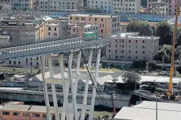  ?? Picture: AFP ?? ON THE EDGE: This general view shows an abandoned truck on the Morandi motorway bridge after a section collapsed on Tuesday in the north-western Italian city of Genoa, killing 35 people.