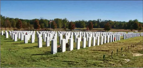  ??  ?? An array of headstones at the veterans cemetery in Birdeye is laid out as a triangle.