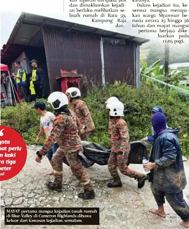  ?? ?? MAYAT pertama mangsa kejadian tanah runtuh di Blue Valley di Cameron Highlands dibawa keluar dari kawasan kejadian, semalam.