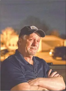  ??  ?? Jeff Carter becomes emotional as he remembers his daughter, Kayla, while sitting outside his home in Milton, W.Va.