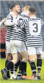  ??  ?? Joy
Queen’s Park players celebrate Finnie’s equaliser