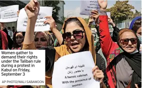  ?? AP PHOTO/WALI SABAWOON ?? Women gather to demand their rights under the Taliban rule during a protest in Kabul on Friday, September 3