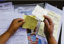  ?? Elizabeth Conley / Staff photograph­er ?? Graciella Gonzalez reviews notes she made while her dad, Ernest Barnard, recovered from bypass surgery. Her 75-year-old father passed away in August 2016 after complicati­ons from a quadruple bypass surgery at St. Luke’s.