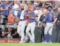  ?? ERIK WILLIAMS / USA TODAY SPORTS ?? The Cubs’ Albert Almora Jr. is consoled by Jason Heyward after a fan was hit by a foul ball in a game in Houston.