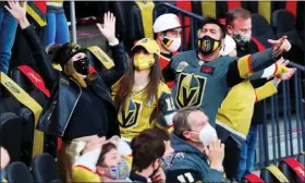  ?? WADE VANDERVORT ?? Vegas Golden Knights fans celebrate a goal against Minnesota during a game Monday at T-mobile Arena.