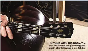  ??  ?? IN TUNE WITH HIS BODY: The Earl of Durham can play the guitar again after following a low-fat diet