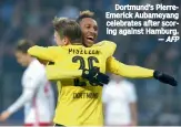  ?? — AFP ?? Dortmund’s PierreEmer­ick Aubameyang celebrates after scoring against Hamburg.