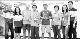  ??  ?? Members of the DLSMC medical team with the winners of the Male 40-49 category (l to r): Nestor Don Santiago, MD; Gloria Coronel, MD; Mario Samson; Regie Lumauag; Rodelio Gadapan; Maria Paula Arenas, MD; Maria Lourdes Suntay Palad, MD, Oliver Wendell...