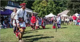  ?? PHOTO PROVIDED BY ERIC JENKS ?? Dressed in regalia, Native American dancers start a community dance at the 2018 Saratoga Native American Festival.