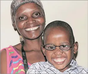 ??  ?? Innocent Ngema, 4, who suffered from congenital bilateral cataracts, with his mother, Nonhlanhla. The provincial Health Department has announced a new eye-care specialist facility planned for the former McCord Hospital in Durban.
