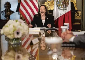  ?? Kent Nishimura Los Angeles Times ?? SHE “TRIES to find joy and happiness in everything,” one former aide says of Vice President Kamala Harris, seen laughing during a virtual meeting with Mexico’s president. Her opponents take a more cynical view.