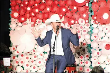  ?? JOSH BRIGGS/THE Saline Courier ?? County Singer Justin Moore performs at the Boys & Girls Clubs of Saline County. Moore will be back to perform during the Golden Jubilee celebratio­n Oct. 22.