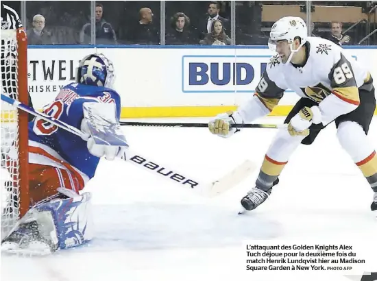  ?? PHOTO AFP ?? L’attaquant des Golden Knights Alex Tuch déjoue pour la deuxième fois du match Henrik Lundqvist hier au Madison Square Garden à New York.