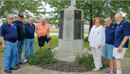  ?? JEAN BONCHAK — FOR THE NEWS-HERALD ?? Members of the Euclid Veterans Associatio­n flank a memorial in Euclid that is dedicated to veterans. Pictured, from left, are Ralph Beuck, Patrick Ludwa, Jeff Morris, Urban Scolaro, Cheryl Ludwa, Alan Belevice and John Prizzi.