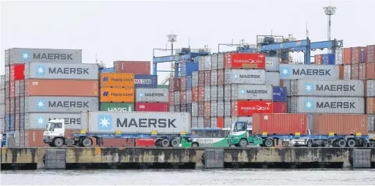  ?? AMANDA PEROBELLI • REUTERS ?? Maersk containers at the Port of Santos, Brazil in September 2019. Shipping group A.P. Moller-maersk warned Wednesday of a sharp drop in global container volumes as a result of COVID-19.