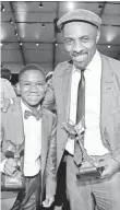  ??  ?? Abraham Attah, left, won best male lead, and his co-star Idris Elba won best supporting male for Beasts of NoNation at the Spirit Awards.