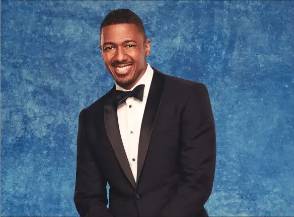  ??  ?? Nick Cannon hosts “The Masked Singer”