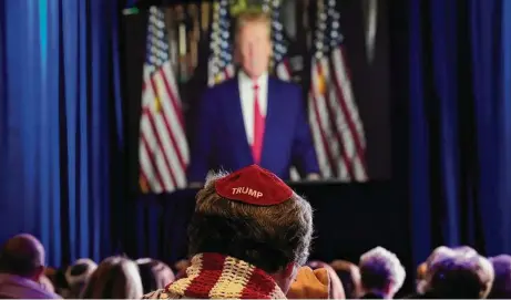  ?? John Locher/Associated Press ?? Former President Donald Trump speaks remotely Saturday to an annual leadership meeting of the Republican Jewish Coalition held in Las Vegas. Other GOP contenders in the 2024 presidenti­al race spoke in person.