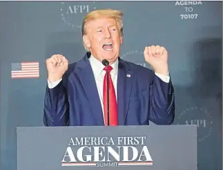  ?? ?? Former US President Donald Trump mocks transgende­r athletes – pretending to be a weightlift­er struggling to lift a barbell – as he addresses an America First Policy Institute agenda summit at the Marriott Marquis in Washington DC on Tuesday as he stokes speculatio­n of another run at the White House
Picture Andrew Harnik/ap