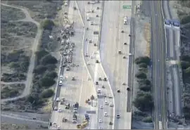  ?? KTLA-TV Channel 5 ?? AN AERIAL view shows the six lanes of the eastbound 210 Freeway converted into three lanes in each direction between the 605 Freeway and Irwindale Avenue.