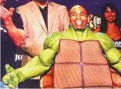  ?? JOURNAL ?? John Dodson, dressed as a Teenage Mutant Ninja Turtle, smiles for the crowd at Thursday’s BKFC ceremonial weighin at Tingley Coliseum. Dodson is scheduled to defend his BKFC flyweight title against Dagoberto Aguero on Friday.
