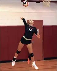  ?? LARRY GREESON / For the Calhoun Times ?? Sonoravill­e’s Abby Chambers Thursday’s match vs. Adairsvill­e. serves during