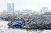  ?? PHOTO: VNA VIA REUTERS ?? Seeking shelter . . . Fishing boats have returned to port in Da Nang to avoid Typhoon Molave.