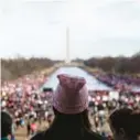  ?? ALEX WROBLEWSKI/GETTY ?? People gather at the Lincoln Memorial reflecting pool to rally before the Women’s March in Washington, D.C., in 2018.