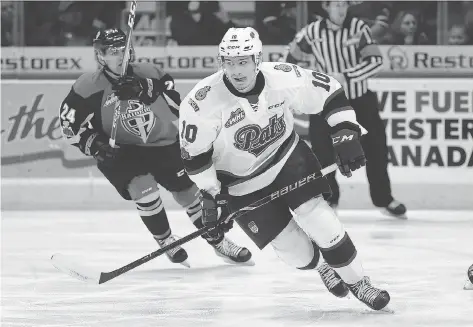  ?? KEITH HERSHMILLE­R ?? Newly acquired Pats forward Austin Pratt is shown in Sunday’s home game against the Prince Albert Raiders.