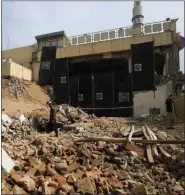  ?? ?? Destroyed mosque after the suicide bomb attack on 30 Jan.