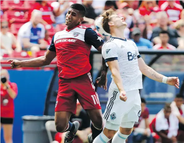  ?? — THE ASSOCIATED PRESS FILES ?? FC Dallas midfielder Santiago Mosquera, left, and Vancouver Whitecaps midfielder Brett Levis compete for a header during an MLS soccer match in Frisco, Texas on May 19 — one of three recent Whitecaps matches that have ended in 2-2 ties.