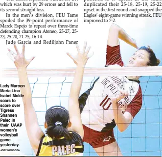  ?? JOEY MENDOZA ?? Lady Maroon Maria Lina Isabel Molde soars to score over Tigress Shannen Palec in their UAAP women’s volleyball game yesterday.