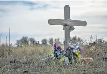  ?? Marc Piscotty via Colorado News Collaborat­ive file ?? The makeshift memorial along Colorado 96 near Brandon, seen here on Nov. 6, 2020, where Zach Gifford was shot and killed.