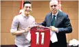  ??  ?? Mesut Özil and President Erdoğan in May