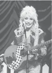  ?? JACK PLUNKETT/INVISION ?? Dolly Parton, seen March 18, donated $1 million to Vanderbilt University Medical Center.