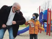  ?? CLIFFORD SKARSTEDT EXAMINER ?? Stuart Harrison visits Easter Seals Ambassador Ryerson Beardmore, 10, at Bridlewood Park on Thursday.