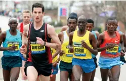  ??  ?? » Above Canada’s Rob Watson leading at the 2013 Boston Marathon