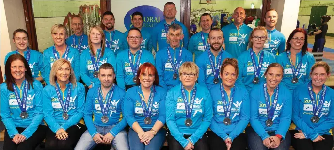  ??  ?? Mary Nolan Hickey with the Arklow athletes who completed the Dublin City Marathon.