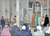  ?? AFP ?? Syriac Orthodox Patriarch of Antioch, Ignatius Aphrem II, gives a sermon during mass at the heavily damaged Syriac Orthodox church of St. Mary in Syria's Deir Ezzor city on Saturday.