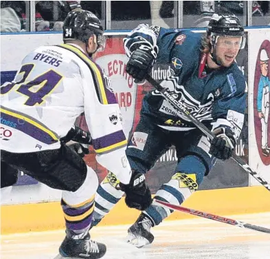  ?? Picture: Derek Black. ?? Johan Andersson, right, in action against Manchester Storm’s Dane Byers, was on the mark in Dundee Stars’ victories over Belfast and Cardiff.