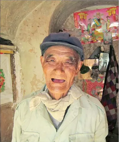  ?? PHOTOS BY ERIK NILSSON / CHINA DAILY ?? Zhang Dehua insists on living in his old cavern, which he says is warm in winter and cool in summer.