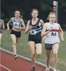  ??  ?? Megan Ellison wins the Under 17 800m for Nene ValleyHarr­iers.