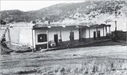  ?? COURTESY MUSEUM OF NEW MEXICO NEGATIVE NO. 008836 ?? RIGHT: The home at Johnson’s Ranch in Cañoncito, where a Confederat­e wagon train was burned during the Civil War Battle of Glorieta Pass, is shown in 1914. The building was bulldozed in 1967 to make way for constructi­on of Interstate 25.