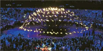  ?? PHOTO: AP ?? One of the defining images of the London 2012 Games, the cauldron devised by Thomas Heatherwic­k, below